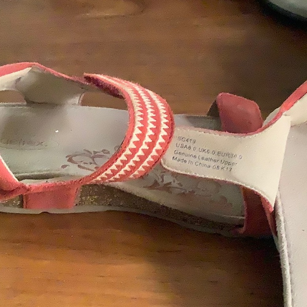 Aetrex rust color gently worn adjustable sandals.